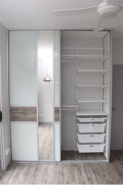 Wardrobe with Floating timber floorboards and elfa shelving