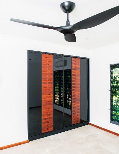 Built in Wardrobe Doors timber louvres and with Black Glass