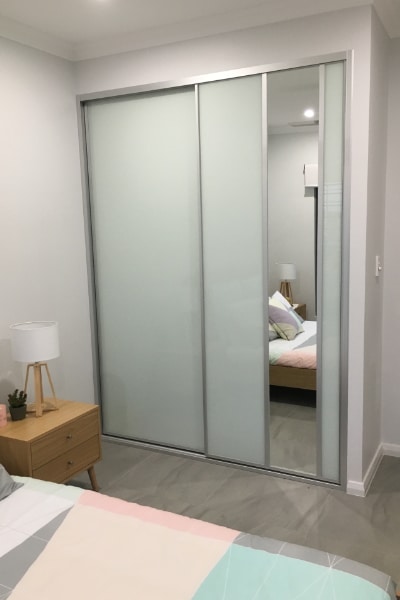 Bedroom Glass Sliding Doors with vertical mirror and grey tile