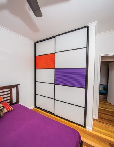 Mondrian Inspired Sliding Doors with Purple and Orange