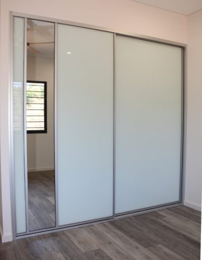 White Glass Sliding Doors with silver mist plank floor boards