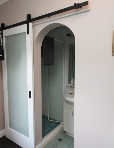 White Barn Doors showing arch opening and ensuite