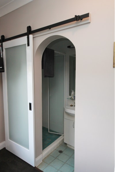 White Barn Doors showing arch opening and ensuite