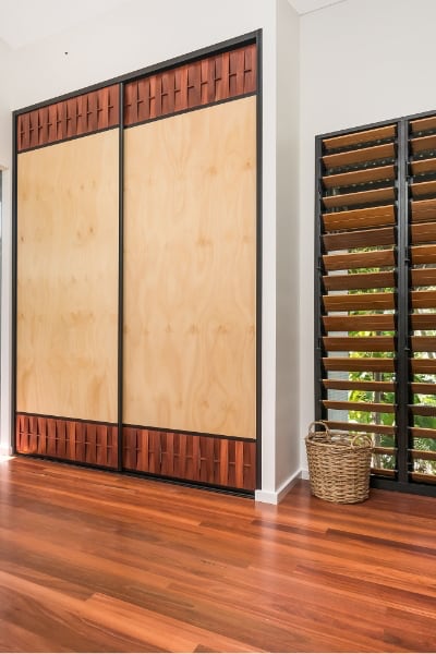 DN Building Pine Panel Jarrah Sliding Doors with timber flooring