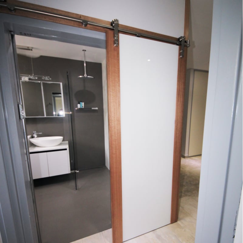 Timber & Glass Barn Door Bathroom to Hallway