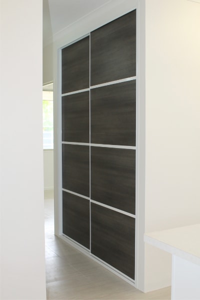 Hallway Cupboard with Charred oak Laminate Multi Panel Design